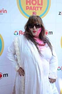 Dolly Bindra poses for the media at Zoom Holi Bash