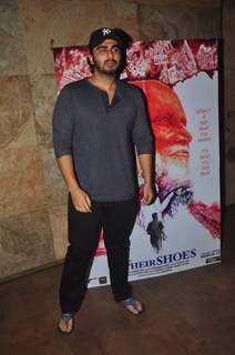 Arjun Kapoor poses for the media at the Special Screening of In Their Shoes