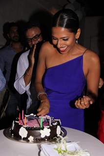 Candice Pinto cuts her birthday cake