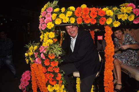 Celebs arrive in a decorated auto at the Special Screening of The Second Best Marigold Hotel