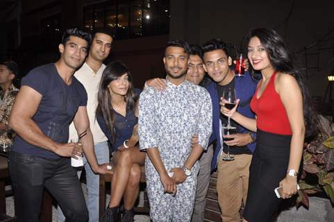 Ken Ferns poses with friends at his 2015 Collection Bash