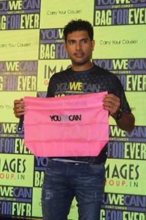 Yuvraj Singh poses with &quot;YOUWECAN' product at India Fashion Forum 2015