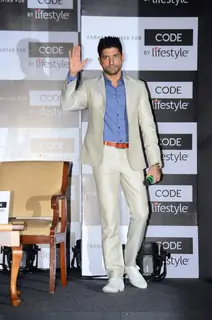 Farhan Akhtar waves to the audience at the Launch of Code for Lifestyle