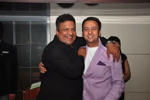Gulshan Grover and Sanjay Gupta pose for the media at the Launch of Harry's Bar & Cafe
