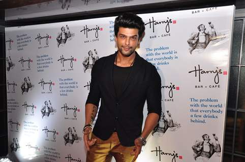 Kushal Tandon poses for the media at the Launch of Harry's Bar & Cafe