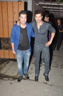 Varun Dhawan and Varun Sharma pose for the media at Karim Morani's Birthday Bash