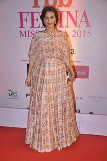 Neha Dhupia poses for the media at Femina Miss India Finals Red Carpet