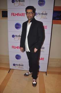 Karan Johar poses for the media at the Cover Launch of Ciroc Filmfare Glamour & Style Awards Issue