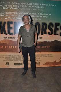 Sudhir Mishra poses for the media at the Special Screening of Broken Horses