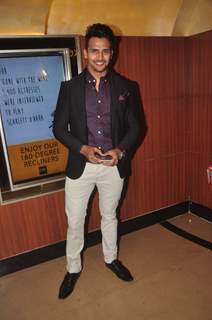 Bhushan Pradhan poses for the media at the Premier of Coffee Aani Barach Kahi