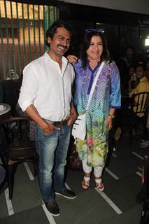 Nawazuddin Siddiqui and Farah Khan pose for the media at the Launch of 'Poetic License'