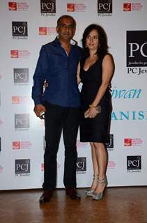 Milan Luthria poses with wife at the Red Carpet of 'Mijwan-The Legacy'