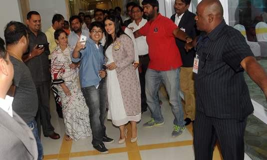 Kajol clicks a selfie with a fan at the Inauguration of Surya Mother & Child Care Hospital