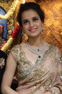 Kangana Ranaut poses for the media at a Jewelry Store Launch
