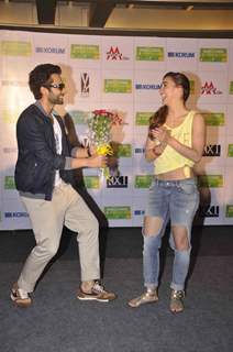 Jackky Bhagnani giving Lauren Gottlieb a bouquet of flowers at the Promotions of Welcome To Karachi