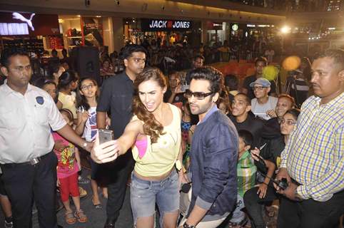 Jackky Bhagnani and Lauren Gottlieb click a selfie with fans at the Promotions of Welcome To Karachi