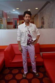 Irrfan Khan poses for the media at the Promotions of Piku on Red FM