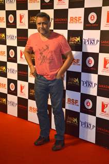 Anubhav Sinha poses for the media at the Success Bash of Piku