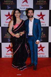 Disha Parmar and Nakuul Mehta pose for the media at Star Parivaar Awards 2015