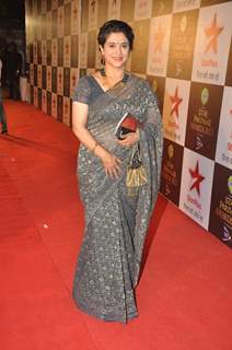 Supriya Pilgaonkar poses for the media at Star Parivaar Awards 2015