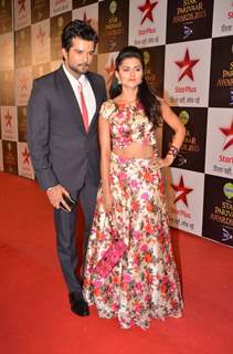 RaQesh Vashisth and Ridhi Dogra pose for the media at Star Parivaar Awards 2015