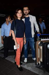 Dia Mirza and Sahil Sangha pose for the media at Airport while leaving for IIFA 2015