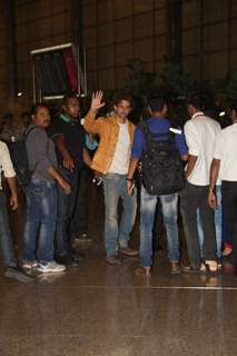 Hrithik Roshan waves to the fans at Airport while leaving for IIFA 2015