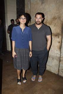 Aamir Khan and Kiran Rao pose for the media at the Special Screening of Dil Dhadakne Do