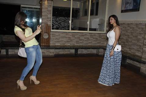 Zarine Khan was snapped clicking Daisy Shah's pic at Rahul Saxena's Dance Fest