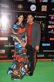 Bhushan Kumar poses with wife Divya Khosla at IIFA 2015 Day 2