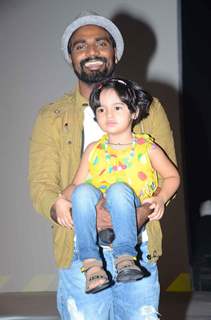 Remo Dsouza was snapped holding a small girl during the ABCD 2 Pond's Men Promotions