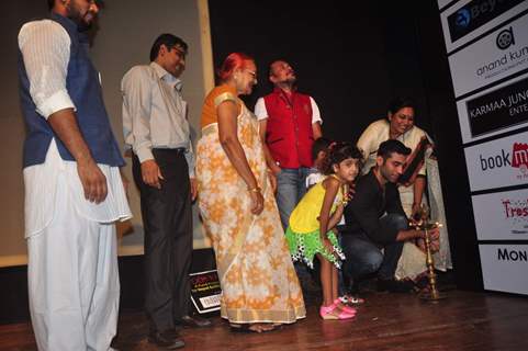 Kushal Punjabi lights the lamp at Toshi Rana's Concert