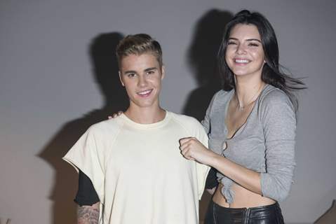 Justin Bieber and Kendall Jenner pose for the media at Calvin Klein Jeans Music Event in Hong Kong