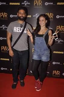 VJ Andy and Elli Avram poses for the media at the Premier of Minions