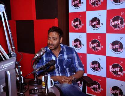 Ajay Devgn interacts with the listeners at the Promotions of Drishyam on Fever FM