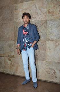 Irrfan Khan poses for the media at the Special Screening of Amy