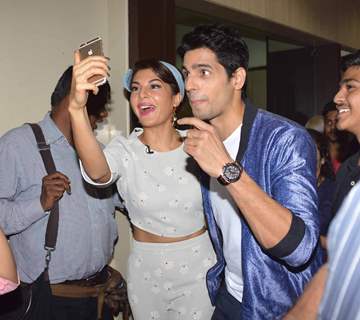 Jacqueline Fernandes and Sidharth Malhotra click a selfie at the Promotions of Brothers at a College