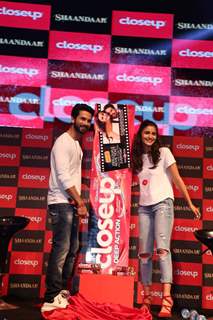 Shahid Kapoor and Alia Bhatt pose for the media at the Close Up First Move Party