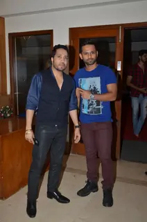Mika Singh and Rahul Vaidya pose for the media at Suresh Wadkar's Birthday Bash