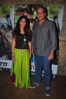 Ashutosh Gowarikar poses with wife at the Special Screening of Katti Batti