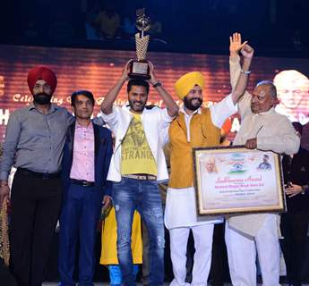 Prabhu Dheva poses with the trophy during the Promotions of Singh is Bling in Delhi