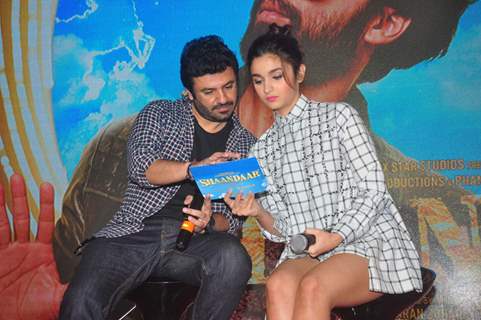 Vikas Bahl and Alia Bhatt discuss vote results at the Song Launch of Shaandaar