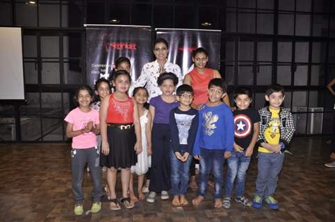 Kajol poses with the kids at Struts Academy Event