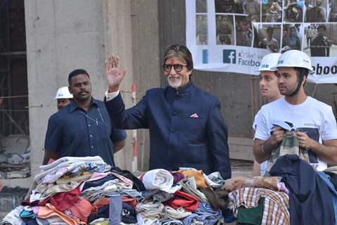 Big B Donates Clothes at a Construction site in Delhi!