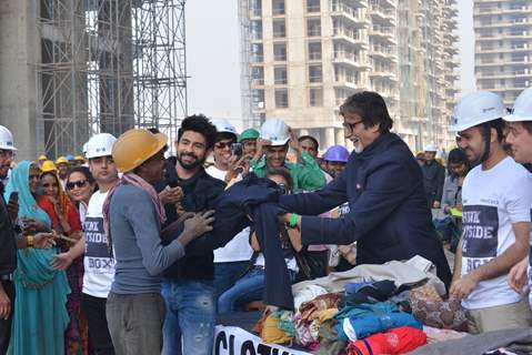 Big B Donates Clothes and interacts with workers!