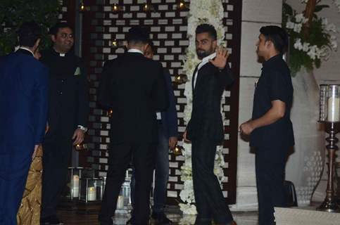 Virat Khohli waves to the media at Mukesh and Nita Ambani's Bash