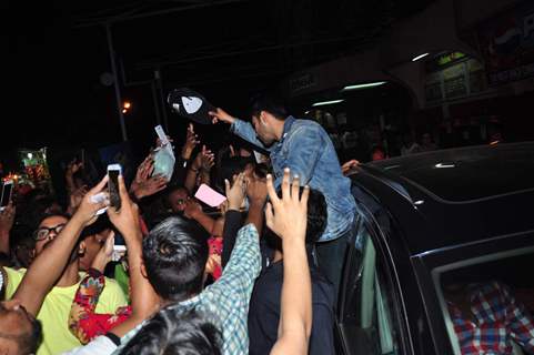 Varun Dhawan gives away his cap to his fan at Gaiety Galaxy