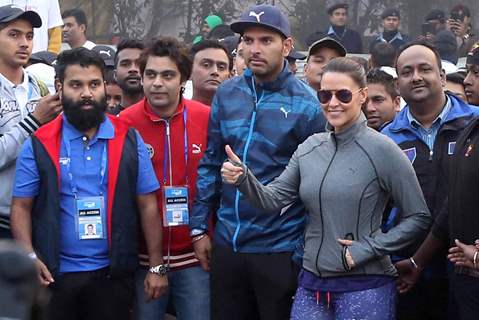 Yuvraj Singh and Neha Dhupia at Kolkata - Marathon