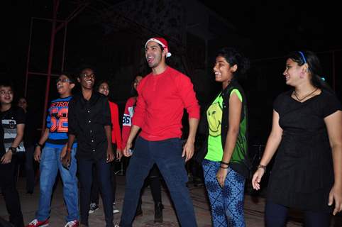 Varun Dhawan shakes a leg with kids at the Christmas Celebrations