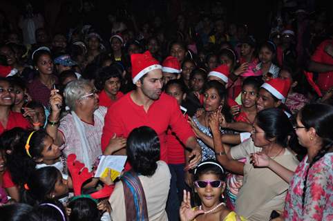 Varun Dhawan interacting with kids at the Christmas Celebrations